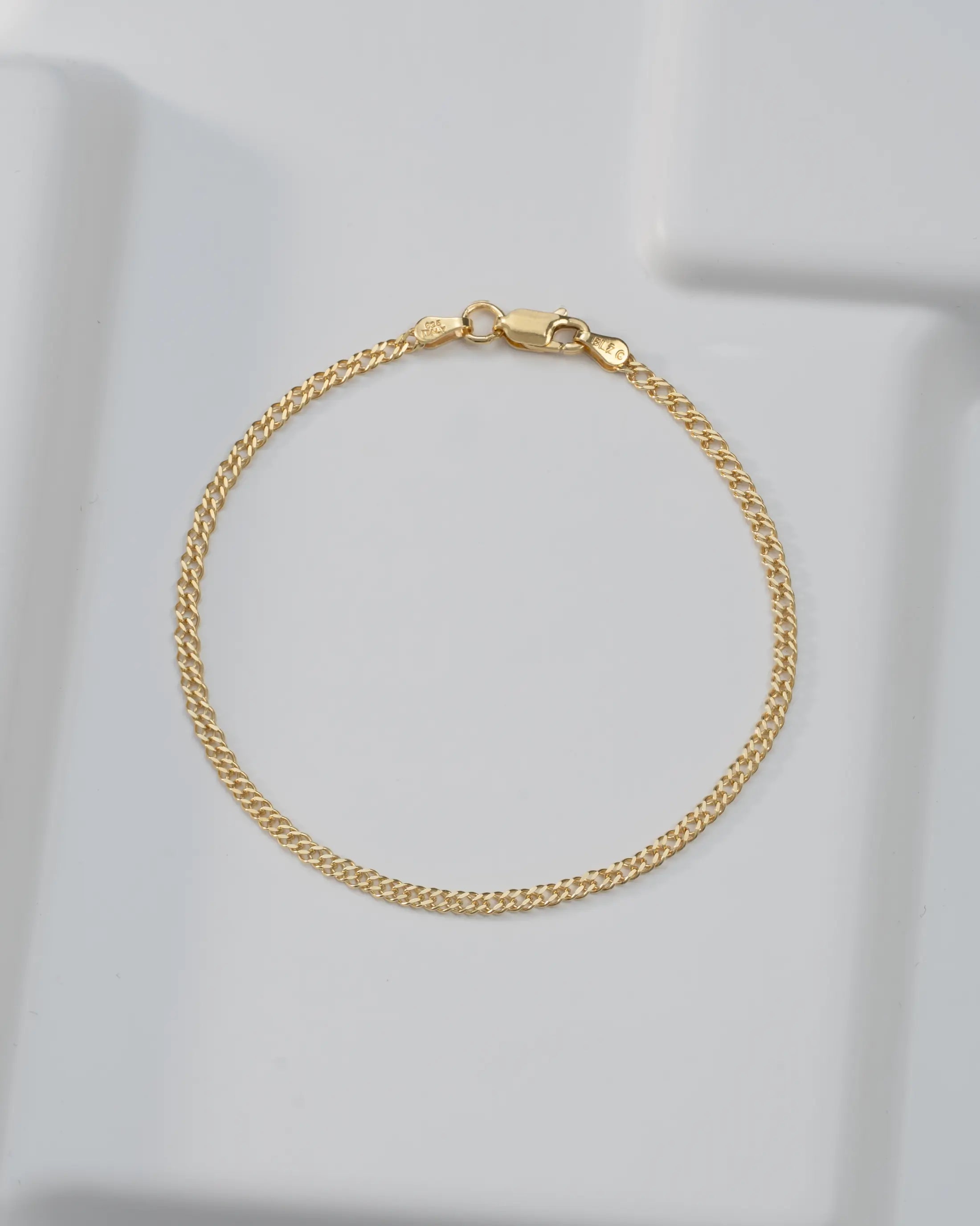 Pulsera Cubana Cruzada 2.4mm 19.5 Cms
